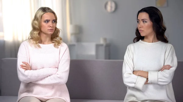 Two Angry Female Friends Sitting Different Parts Sofa Revivals Conflict — Stock Photo, Image