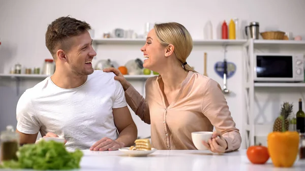 Positive Young Couple Laughing Having Breakfast Fooling Together — Stock Photo, Image