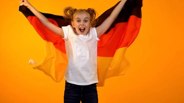 Happy Schoolgirl Jumping German Flag Supporting National Sport Team Fan — Stock Photo, Image