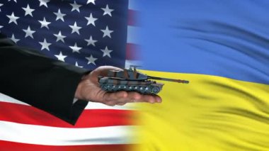 ABD ve Ukrayna yetkilileri para için tank alışverişi, bayrak arka plan müzakere