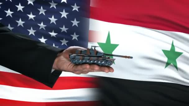 USA and Syria officials exchanging tank money, flag background, military forces — Stock Video