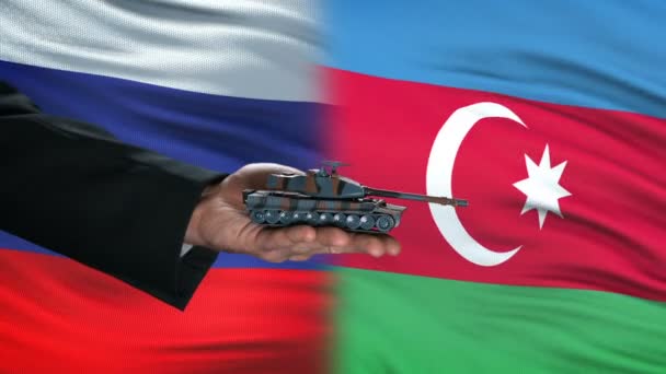 Rusia y Azerbaiyán intercambian tanque por dinero, fondo de la bandera — Vídeos de Stock