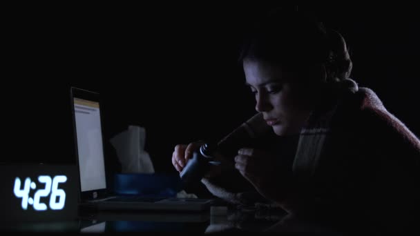 Sick lady pouring syrup sitting at computer at night, suffering flu symptoms — Stock Video