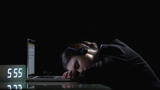 Exhausted lady office worker sleeping on laptop, suffering extensive workload — Stock Video