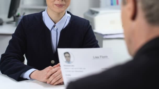 Director shaking hand of young female employee, successful job interview, career — Stock Video