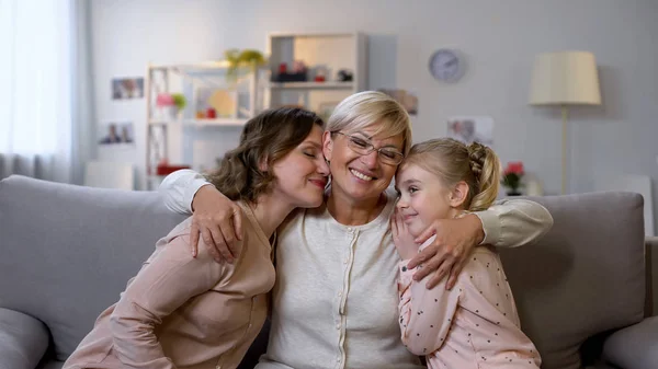 Mother Granny Girl Hugging Sitting Sofa Home Family Closeness Love — Stock Photo, Image