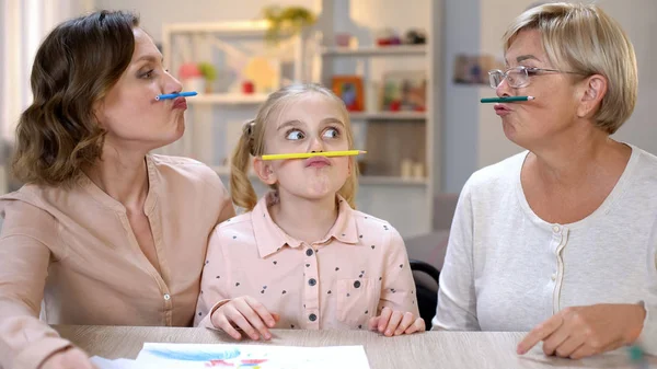 Funny Multi Generation Females Holding Color Pencils Nose Lips Game — Stock Photo, Image