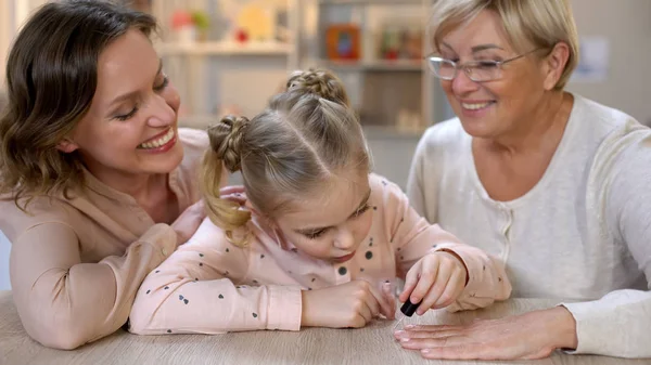 Little Girl Painting Grandmother Nails Doing Manicure Female Beauty Leisure — Stock Photo, Image