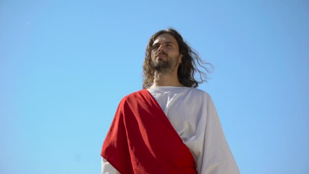 Jesus raising hands to sky and praying, resurrection and ascension of Christ — Stock Video