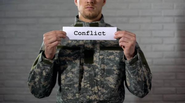 Conflicto Palabra Escrita Signo Manos Soldado Anexión Militar Guerra — Foto de Stock