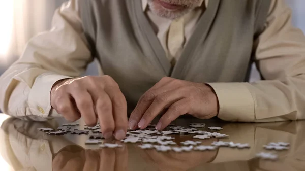 Grandfather Trying Put Puzzle Together Concentration Exercise Motor Skills — Stock Photo, Image