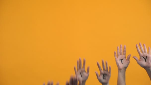 Society written palms on orange background, teamwork togetherness, support — Stock Video