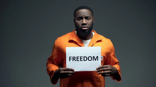 Black Imprisoned Male Holding Freedom Sign Cell Asking Help Human — Stock Photo, Image