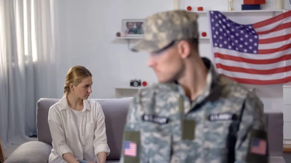 Angry Wife Sitting Sofa Military Husband Foreground Misunderstanding — Stock Photo, Image