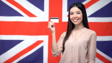 İngiliz arka plan, uluslararası bankacılık karşı Kadın holding kredi kartı