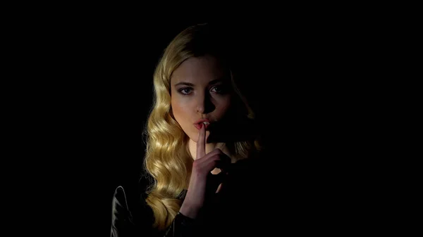 Pretty Blond Female Showing Silence Gesture Dark Background Spying — Stock Photo, Image