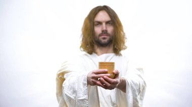 Tanrı'nın Oğlu şarap tutan, Katolik kilisesinde kutsal Eucharist, Komünyon