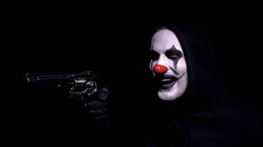 Palyaço yüz maskesi silah nişan sözleşme katil, çılgın soyguncu kurbanı korkutan