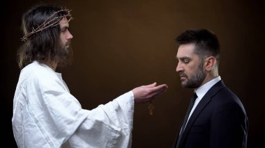 Tanrı'nın oğlu ahşap haç işadamı veren, ruhun kurtuluşu, günah bağışlama