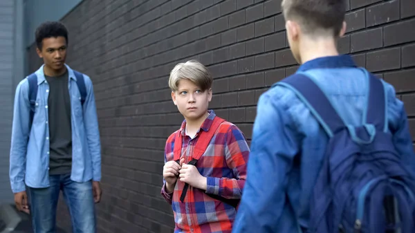 Cruel Teenagers Threatening Younger Boy Physical Intimidation School Bullying — Stock Photo, Image
