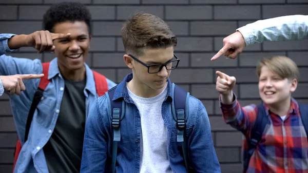 Cruel Schoolchildren Pointing Fingers Student Mocking Smart Boy Bullying — Stock Photo, Image