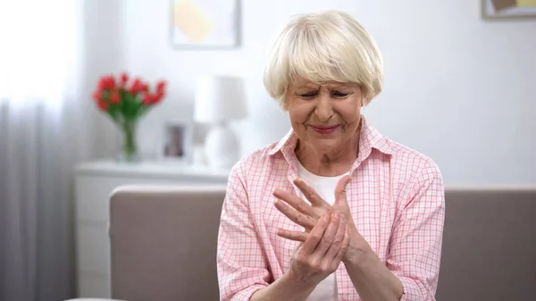 Upset Old Woman Suddenly Feeling Sharp Pain Wrist Arthritis Health — Stock Photo, Image