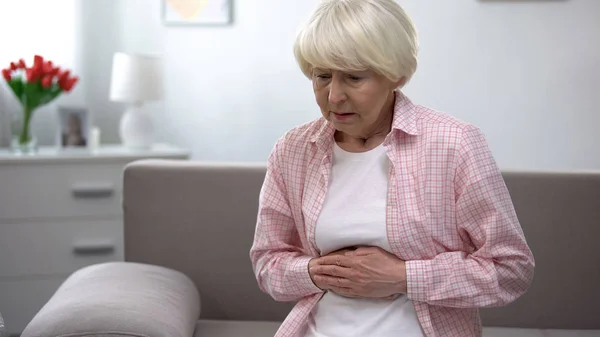 Upset Old Woman Holding Hands Stomach Suffering Gastritis Disease — Stock Photo, Image
