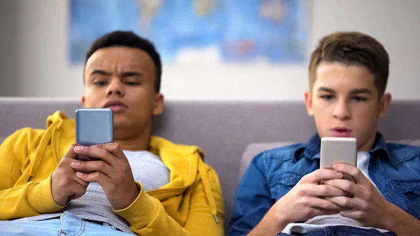 Male Teenagers Reading Shocking News Social Networks Modern Technology — Stock Photo, Image