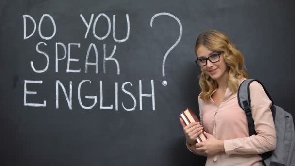 Smart girl asking Do you speak English, language courses with native speaker — Stock Video