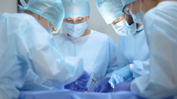 Surgical operating team performing thoracic surgery in modern hospital, health — Stock Video