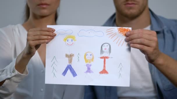 Couple tearing family drawing on two pieces, divorce consequences, kids trauma — Stock Video