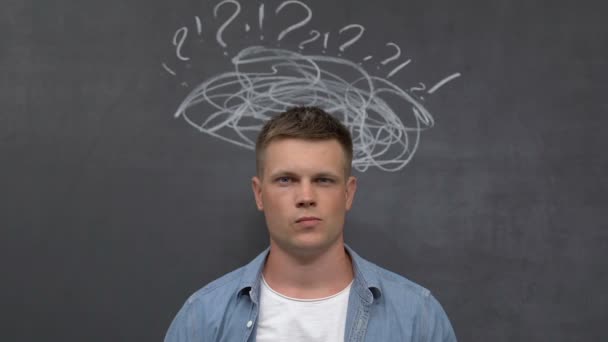 Puzzled young male scratching head having money shortage, unemployment, loan — Stock Footage Puzzled young male scratching head having money shortage, unemployment, loan Stock Footage