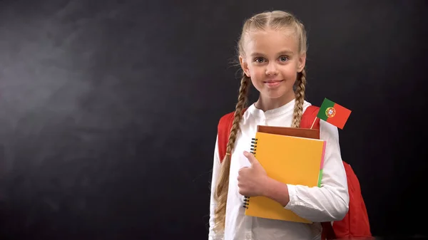 Happy Pupil Holding Books Portugal Flag Ready Learn Foreign Language — Stock Photo, Image