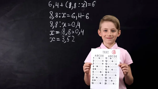 Diligent Smiling Schoolboy Showing Excellent Test Math Exercise Written — Stock Photo, Image