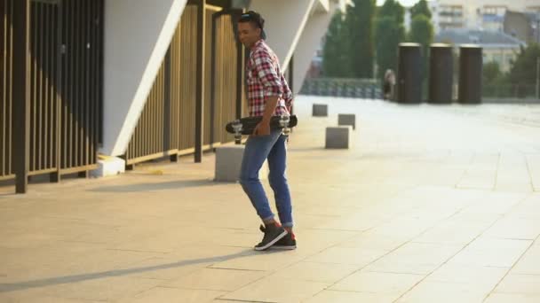 Afro-american boy moonwalking on street, imitating idol singer, creative talent — Stock Video