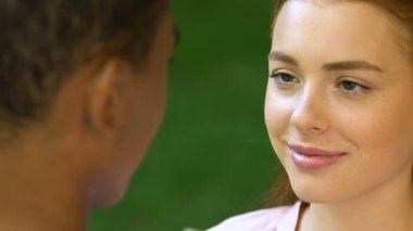 Pretty girl gently stroking beloved man, overwhelmed with love, sincere feelings