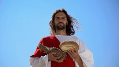 İsa ekmek ve şarap şişe tutan, Kutsal Eucharist ayin yemek paylaşımı