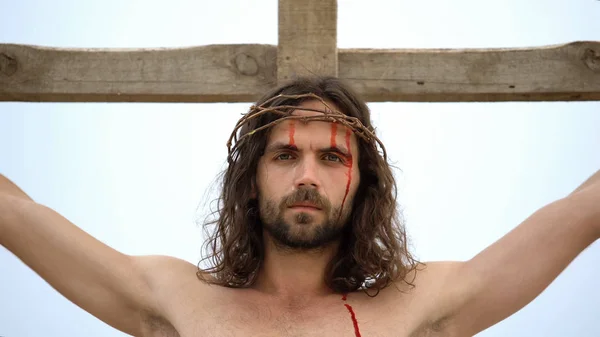 Exhausted Jesus Nailed Cross Looking Camera Atoning Humanity Sins — Stock Photo, Image