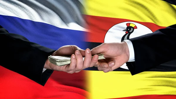 Russische Und Ugandische Beamte Tauschen Geld Flaggen Geschäfte Aus — Stockfoto