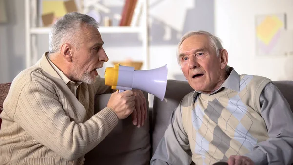 Elderly Male Talking Megaphone Deaf Old Friend Health Problems Close — Stock Photo, Image