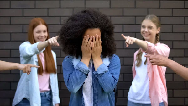 Humiliated Black Schoolgirl Covering Face Hands College Peers Pointing Fingers — Stock Photo, Image