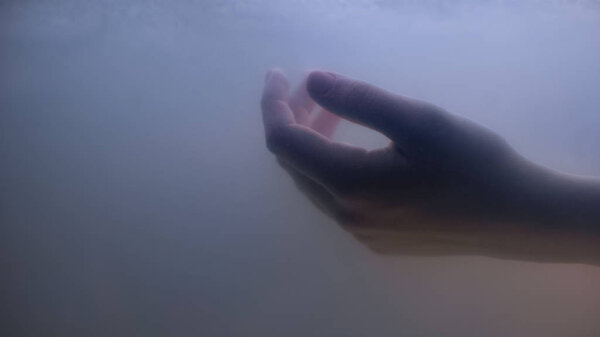 Female hand under dark water, drowned victim of suicide crime, life problem