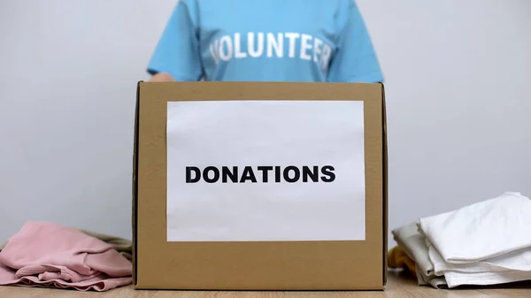 Volunteer Standing Donation Box Clothes Orphanage Care Concept — Stock Photo, Image