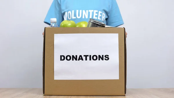 Young Volunteer Putting Canned Food Donation Box Table Working Social — Stock Photo, Image