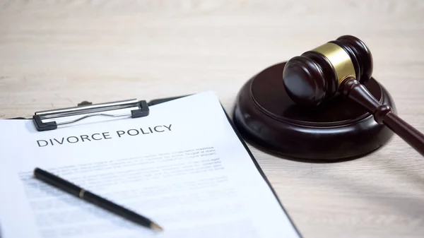 stock image Divorce policy document on table, gavel lying on sound block, family law