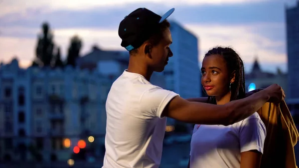 Gallant Teenage Boy Putting Shirt Girlfriend Showing Care Protection — Stock Photo, Image