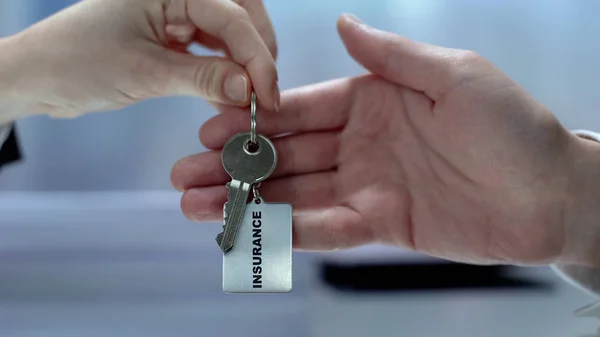 Female Customer Taking Keychain Insurance Agent Health Protection Care — Stock Photo, Image