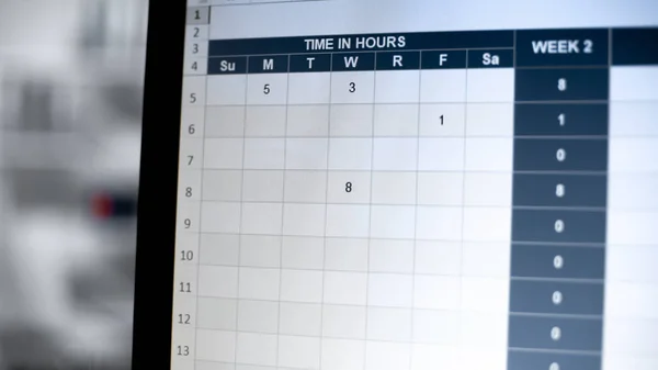 电脑屏幕上的时间管理表 在线访问日志 小时时间 — 图库照片
