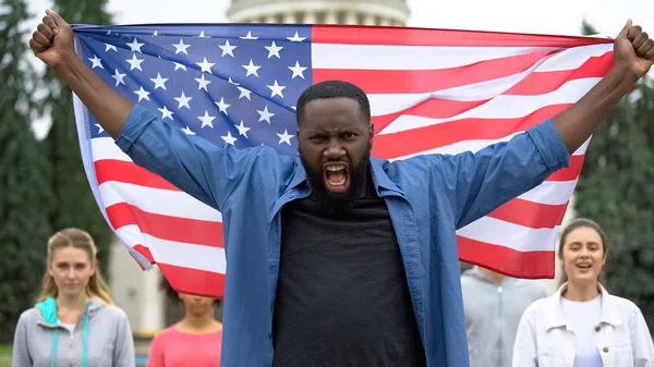 Irritated Black Man Raising American Flag Racist Rally Migrant Crisis — Stock Photo, Image