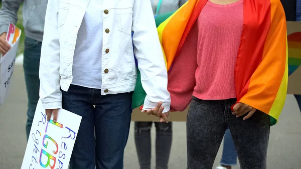 Female Lgbt Activists Holding Each Other Hand Rainbow Symbols Posters — Stock Photo, Image